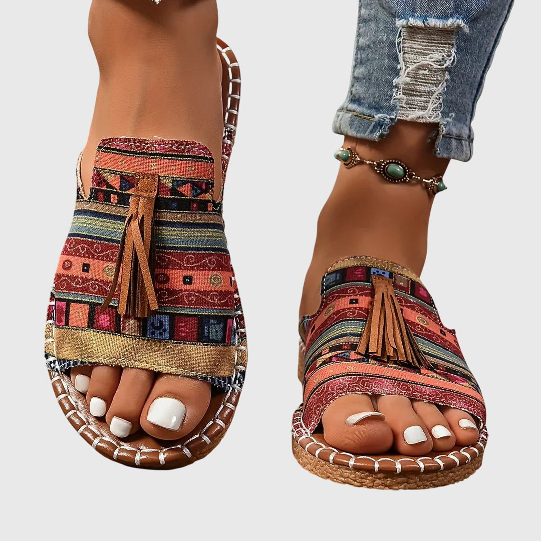 Claire | Mules à motif tacheté et pompon