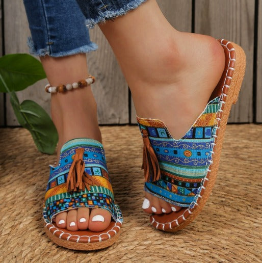 Claire | Mules à motif tacheté et pompon