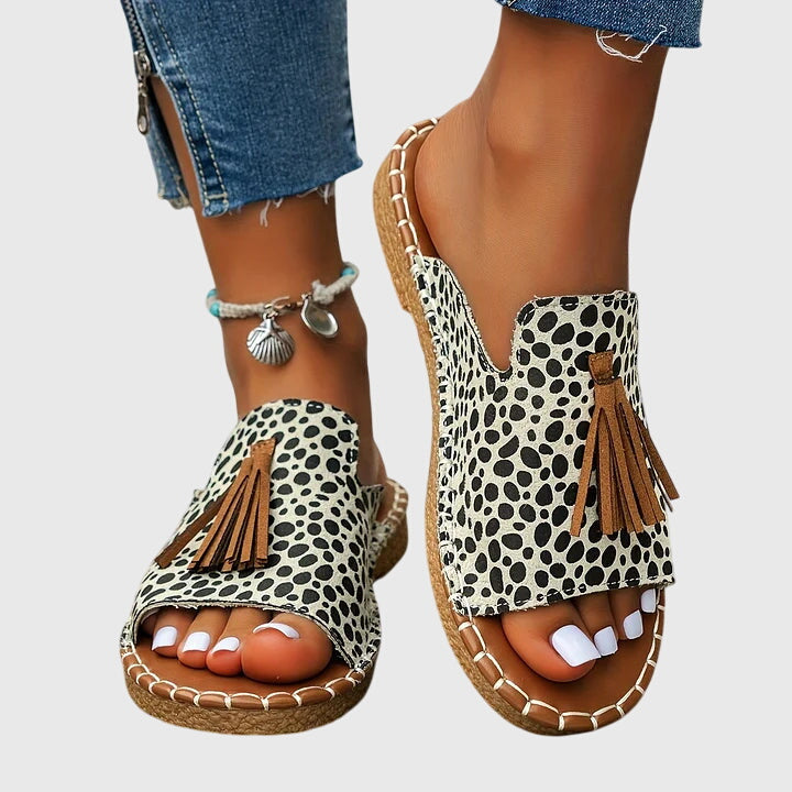 Claire | Mules à motif tacheté et pompon